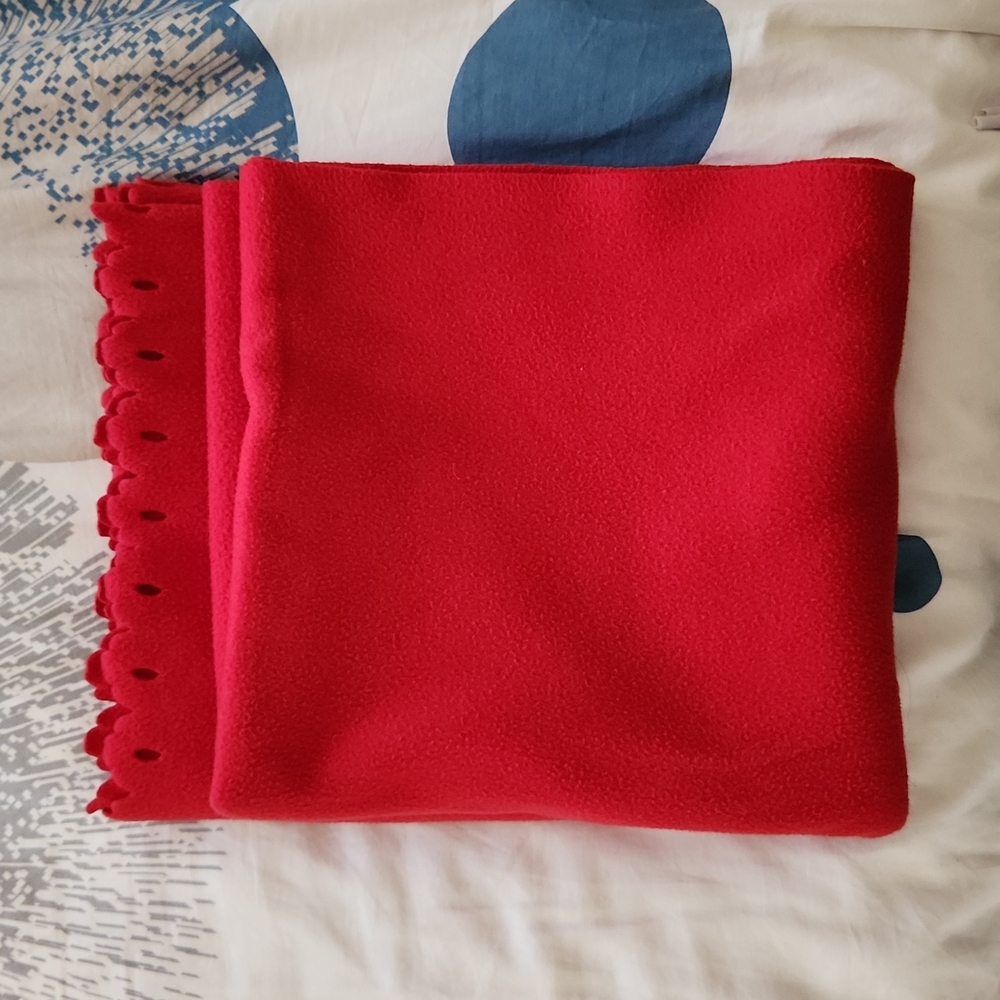 Red fleece throw/blanket 50" x 60". One size.